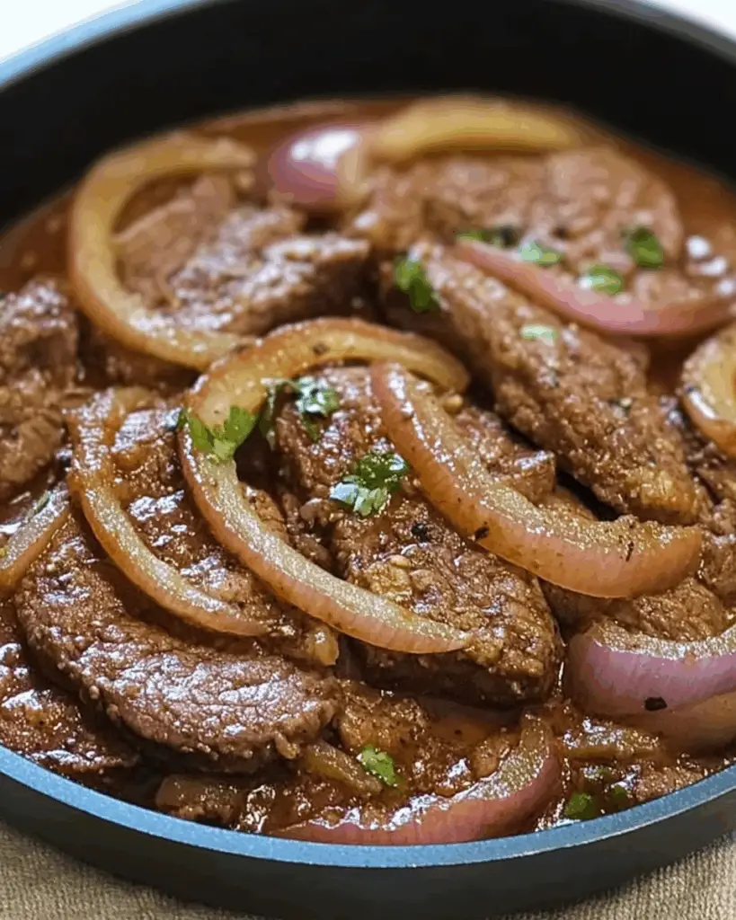 Bistec Encebollado